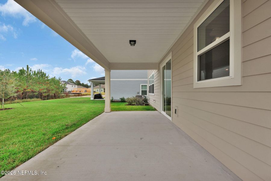 Exterior details and patio area of a home in Hyland Trail, Green Cove Springs (Image 29).
