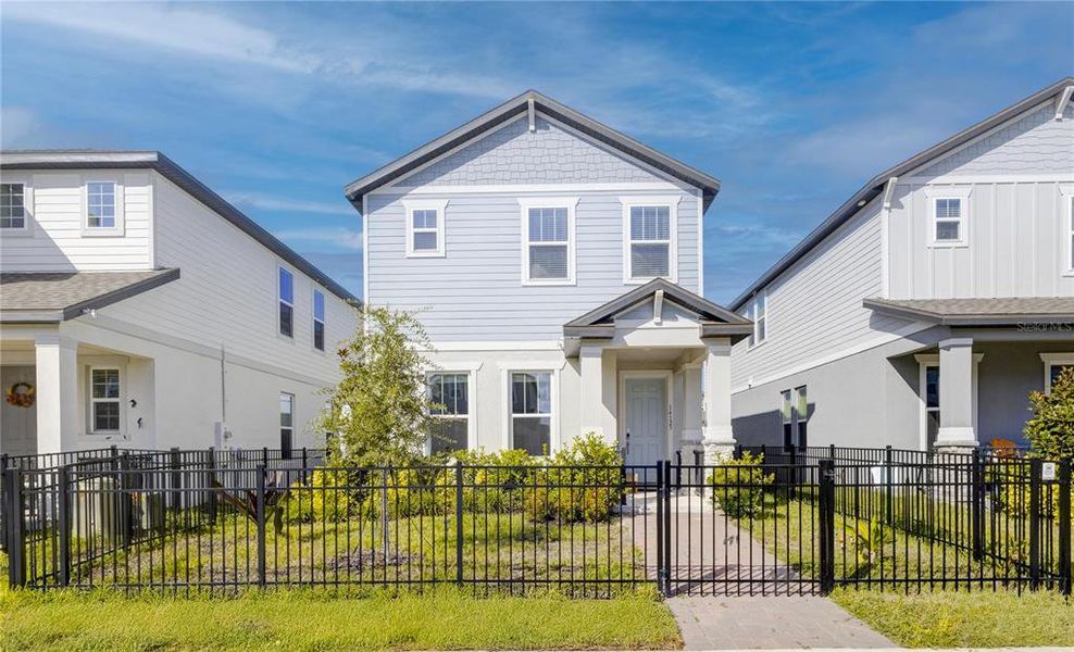 Front exterior of a new home in , Winter Garden, FL, highlighting curb appeal (Image 24).
