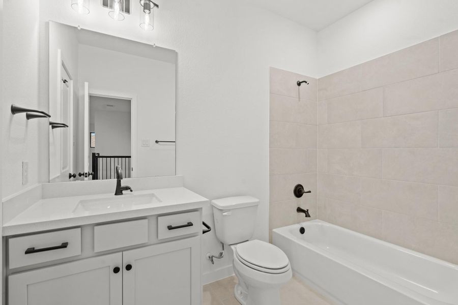 Furnished interior view inside a new home in Legacy Prairie at Katy Court 60', Katy (Image 7).