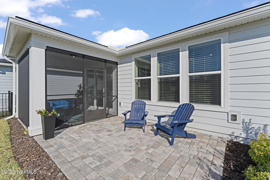 Exterior details and patio area of a home in Summer Bay at Grand Oaks, St. Augustine (Image 26).