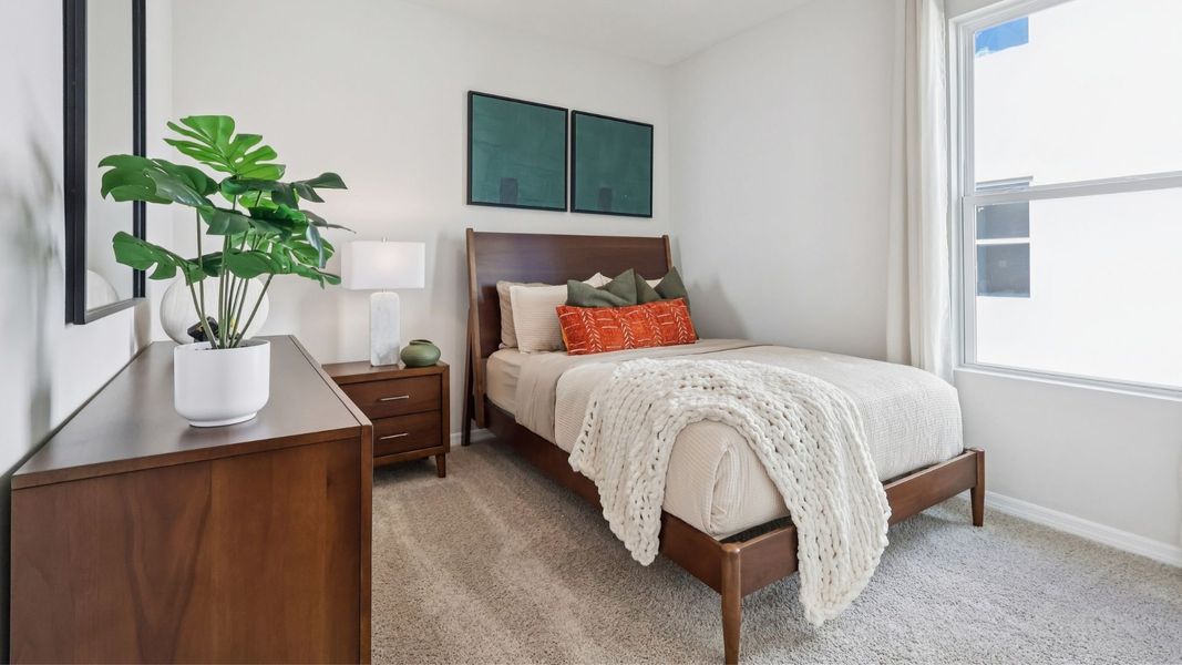 Representative furnished interior of a home built from the Robinson by D.R. Horton in Harmony West, St. Cloud (Image 14).