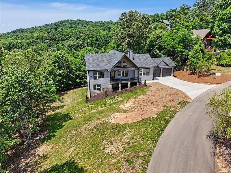 Front exterior of a new home in , Morganton, GA, highlighting curb appeal (Image 2). Front exterior of a new home in , Morganton, GA, highlighting curb appeal (Image 2).
