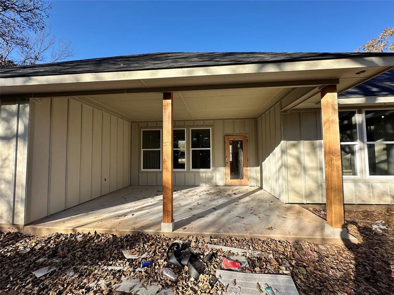 Entrance to property with a patio area