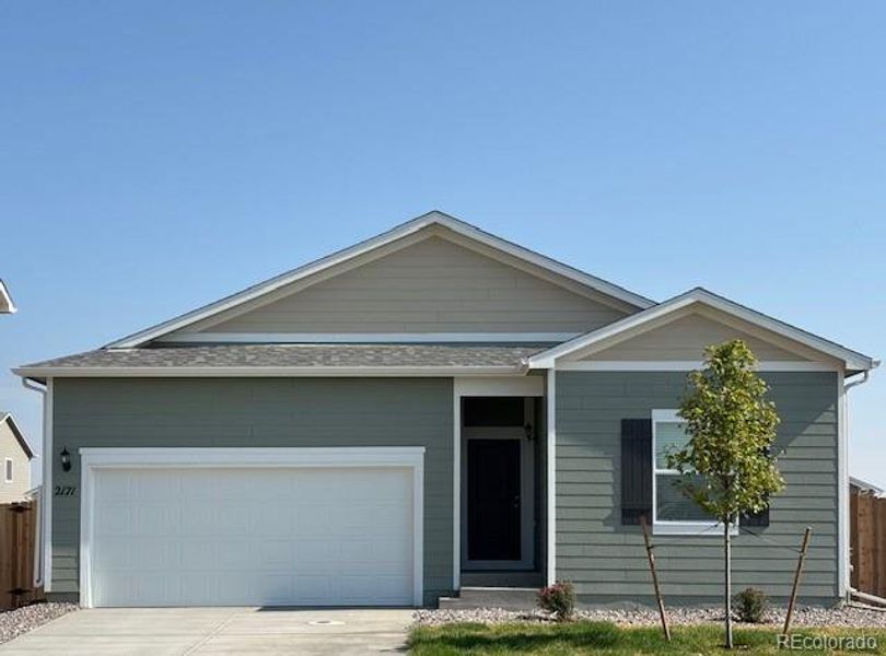 Front exterior of a new home in Cottonwood Greens, Fort Lupton, CO, highlighting curb appeal (Image 15).