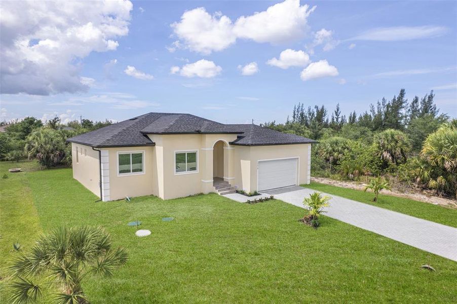 Front exterior of a new home in , Port Charlotte, FL, highlighting curb appeal (Image 29). Front exterior of a new home in , Port Charlotte, FL, highlighting curb appeal (Image 29).