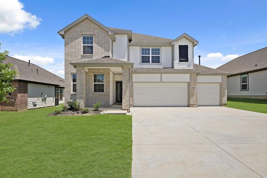Front exterior of a new home in Rocky Creek Crossing, Fort Worth, TX, highlighting curb appeal (Image 2). Front exterior of a new home in Rocky Creek Crossing, Fort Worth, TX, highlighting curb appeal (Image 2).