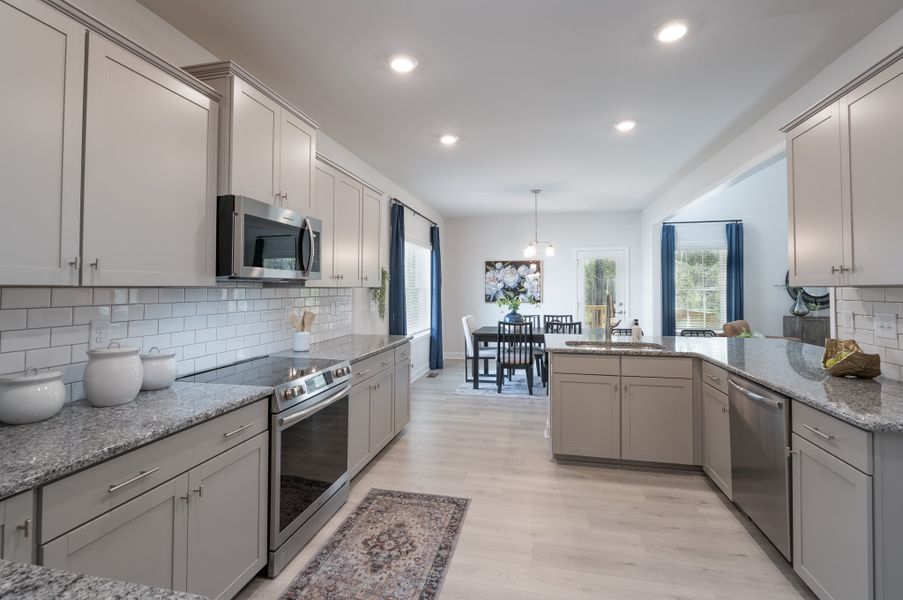 Representative furnished interior of a home built from the 3320 by Adams Homes in Norris Landing, Snellville (Image 16).