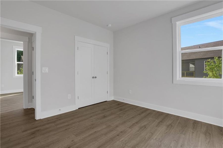 Spacious, unfurnished interior of a new home in The Paddocks at Doc Hughes, Buford (Image 35).