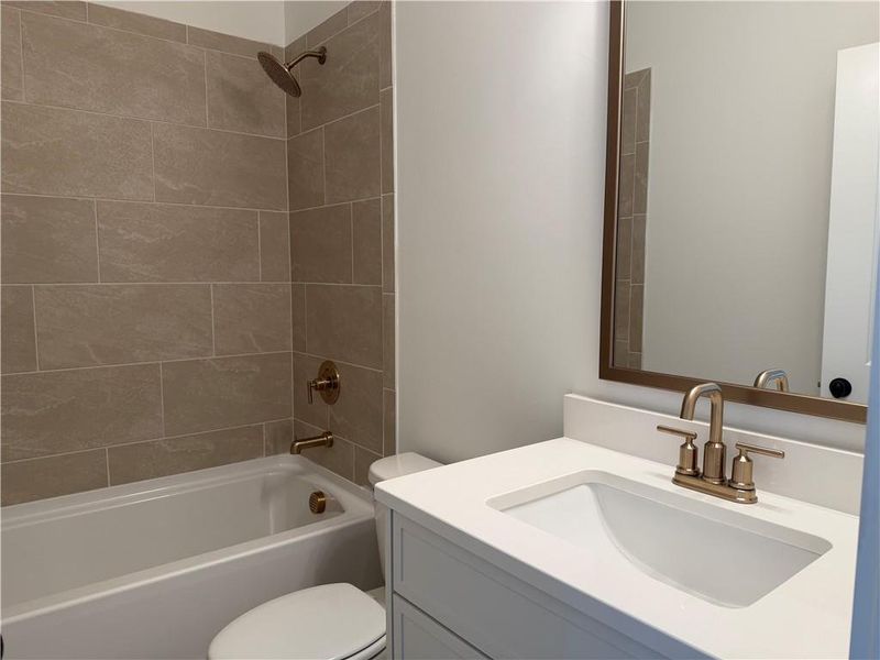 Furnished interior view inside a new home in Woodford, Acworth (Image 13).