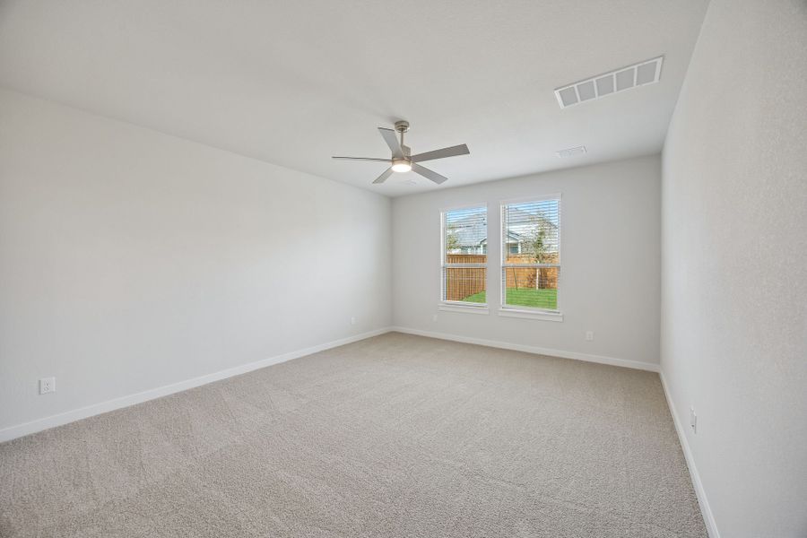 Primary Suite in the Masters home plan by Trophy Signature Homes – REPRESENTATIVE PHOTO