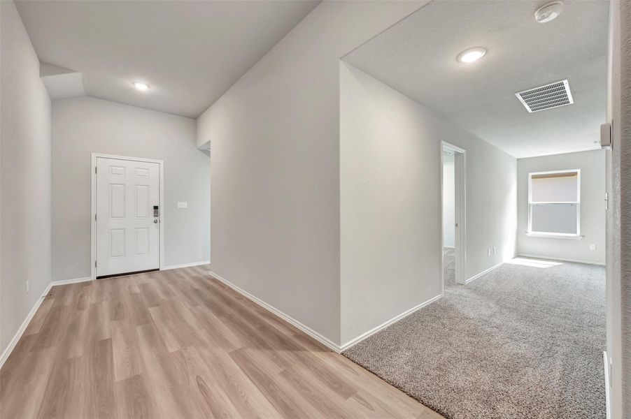 Spacious, unfurnished interior of a new home in Carillon, Manor (Image 23).