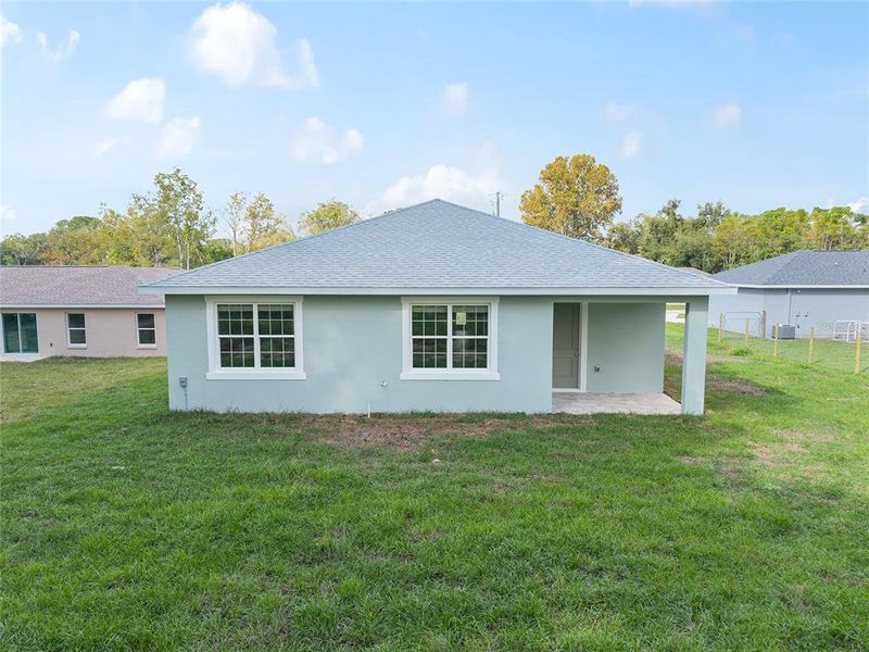 Exterior details and patio area of a home in , Summerfield (Image 32). Exterior details and patio area of a home in , Summerfield (Image 32).