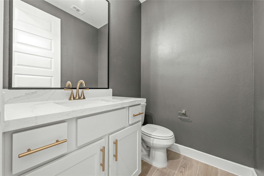 Furnished interior view inside a new home in Sunterra, Katy (Image 9).