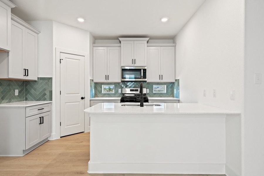 Furnished interior view inside a new home in Crosswinds, Kyle (Image 21).