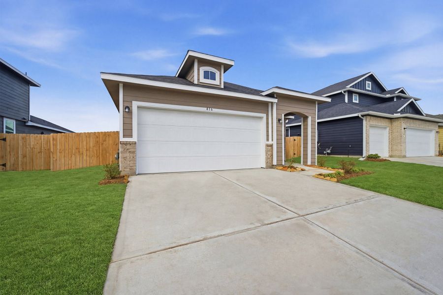 Front exterior of a new home in The Reserve at Huntsville, Huntsville, TX, highlighting curb appeal (Image 2).