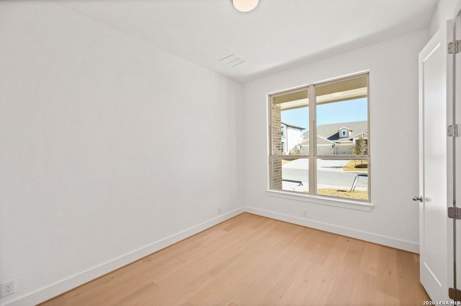 Spacious, unfurnished interior of a new home in Davis Ranch, San Antonio (Image 15).