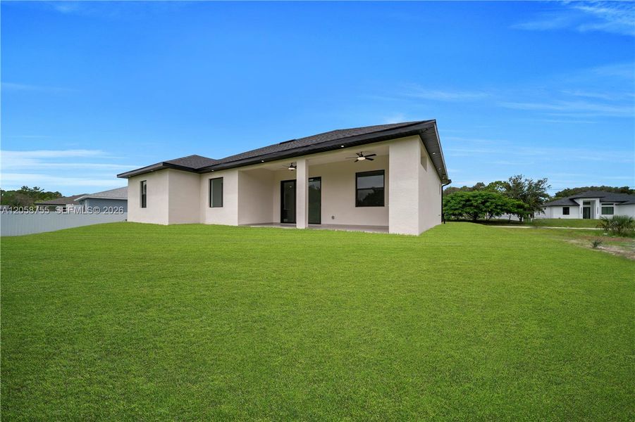 Exterior details and patio area of a home in , Lehigh Acres (Image 25).