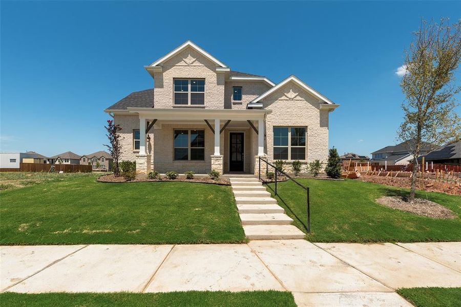 Front exterior of a new home in Villages of Creekwood, Frisco, TX, highlighting curb appeal (Image 19). Front exterior of a new home in Villages of Creekwood, Frisco, TX, highlighting curb appeal (Image 19).
