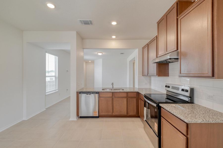 Furnished interior view inside a new home in Sonterra - Cool Water, Jarrell (Image 8).