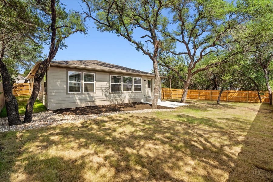 large yard which wraps around to the side of the house - plenty of room to store a boat or RV