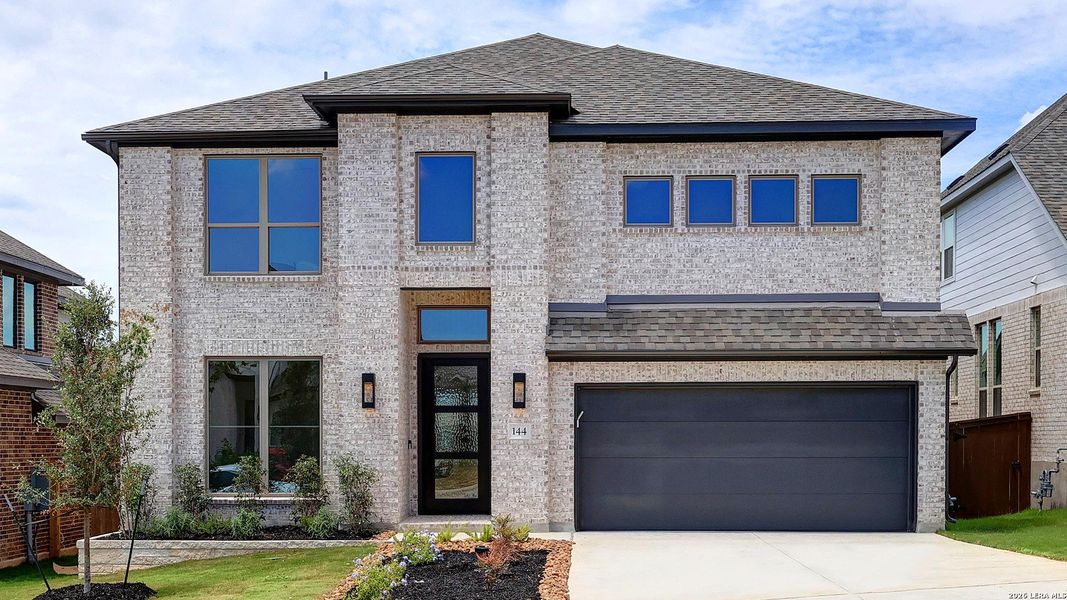Front exterior of a new home in Corley Farms, Boerne, TX, highlighting curb appeal (Image 2). Front exterior of a new home in Corley Farms, Boerne, TX, highlighting curb appeal (Image 2).