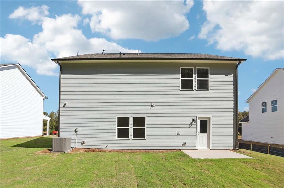 Exterior details and patio area of a home in The Pointe at Heron Bay, Locust Grove (Image 4).