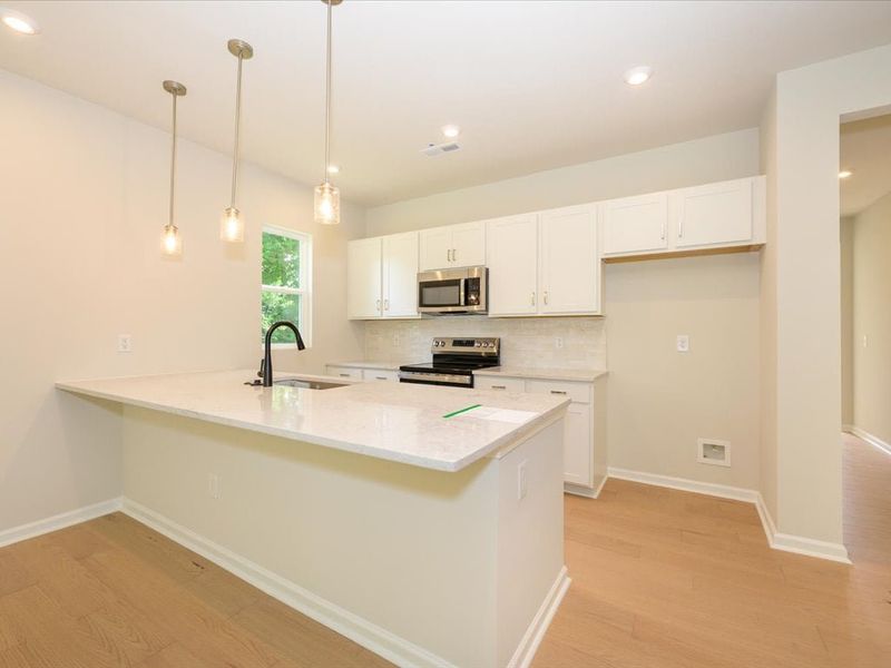 Furnished interior view inside a new home in Fifteen 15 Cannon, Charlotte (Image 5).