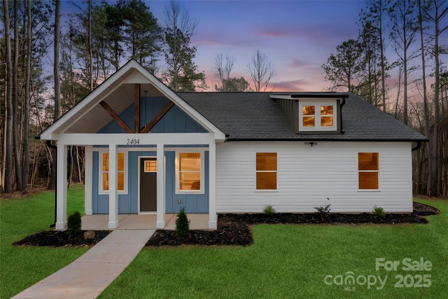 Front exterior of a new home in , Shelby, NC, highlighting curb appeal (Image 25).