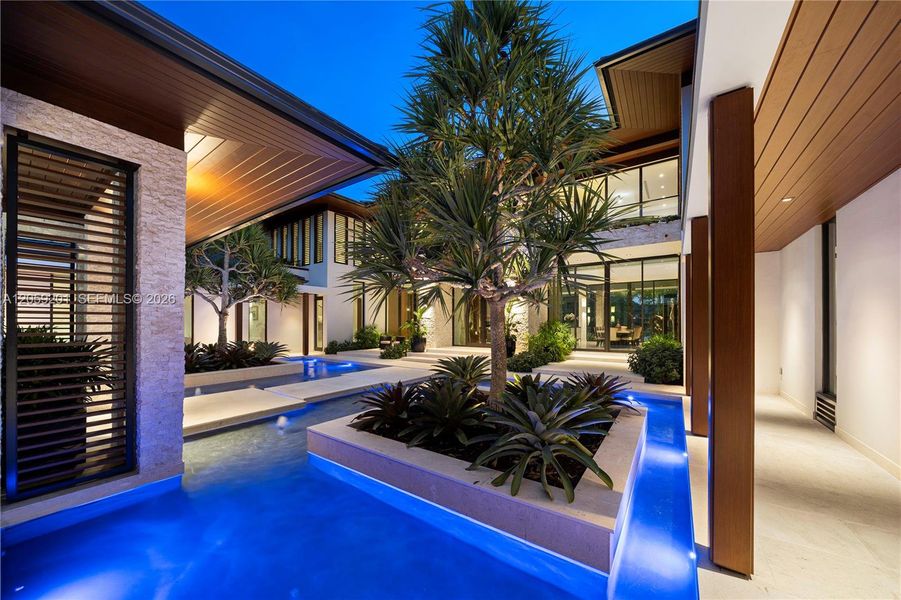 Exterior details and patio area of a home in , Coral Gables (Image 26).