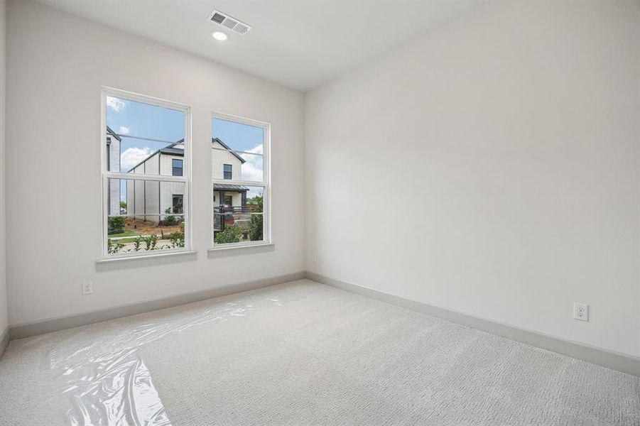 One of two nicely sized secondary bedrooms in our Alexis plan.