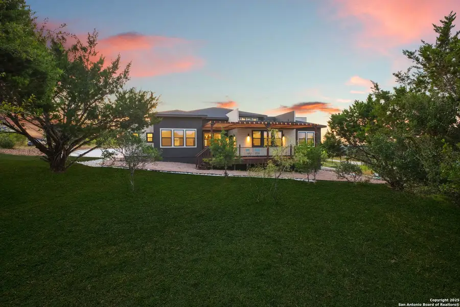 Front exterior of a new home in , Spring Branch, TX, highlighting curb appeal (Image 2).