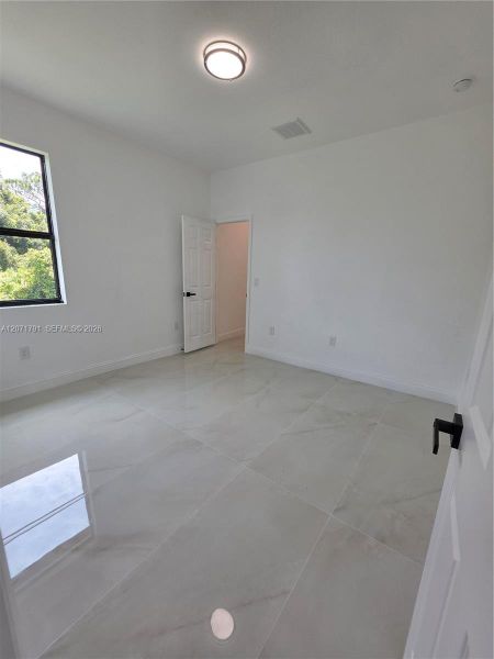 Spacious, unfurnished interior of a new home in , Lehigh Acres (Image 35).
