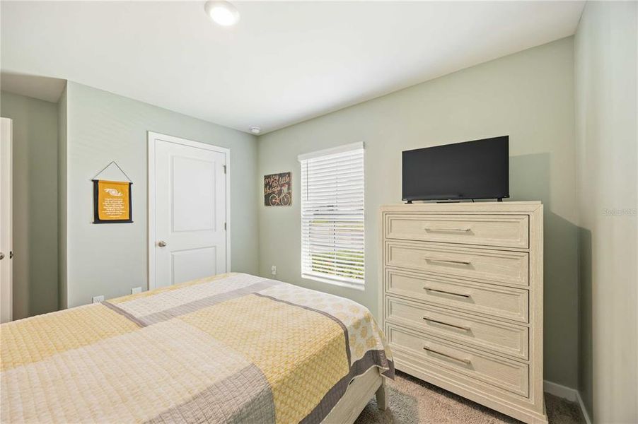 Furnished interior view inside a new home in Central Parc, North Port (Image 29).