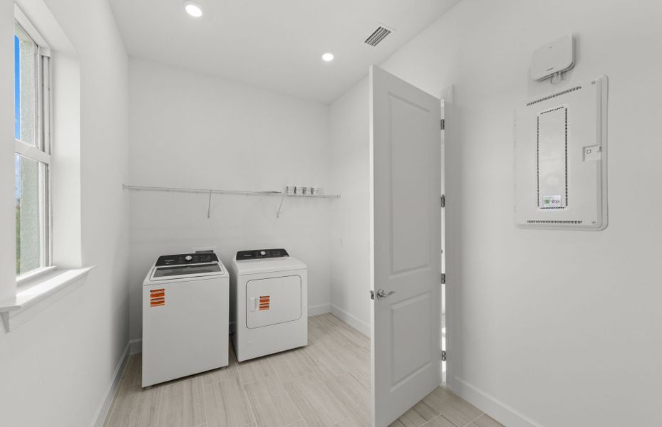 Furnished interior view inside a new home in TerraWalk at Babcock Ranch, Alva (Image 15).