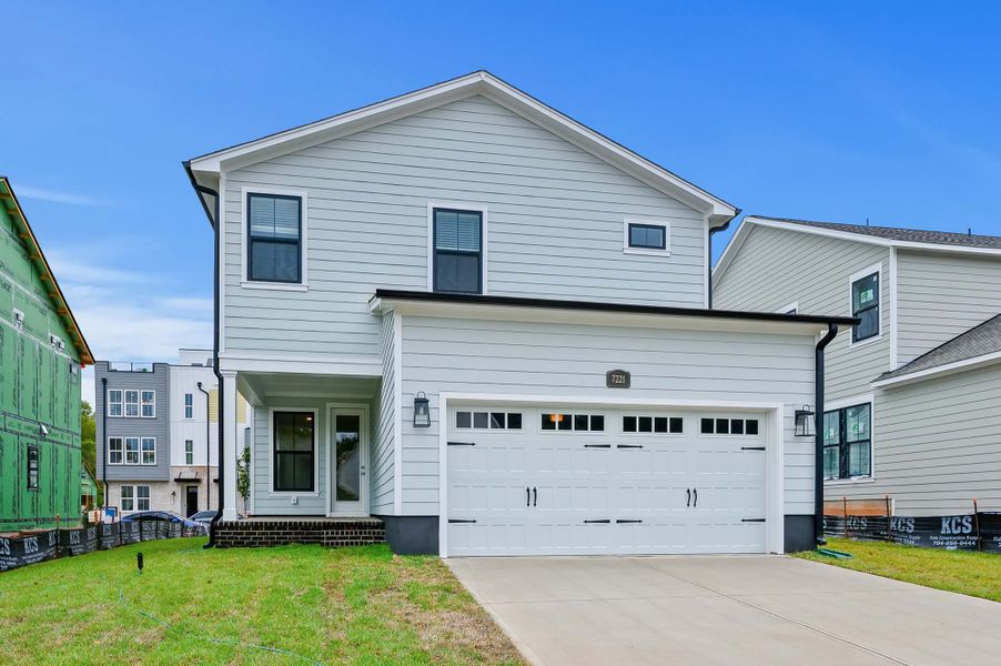 Representative exterior details of a home built from the The Warrington by David Weekley Homes in The River District - Pioneer Collection, Charlotte (Image 4).