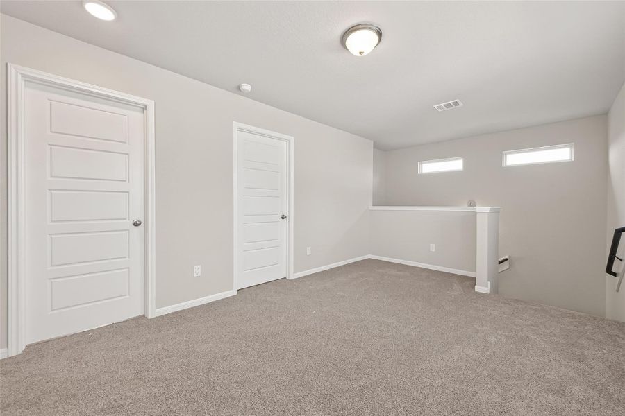 Spacious, unfurnished interior of a new home in Woodland Lakes, Houston (Image 37).
