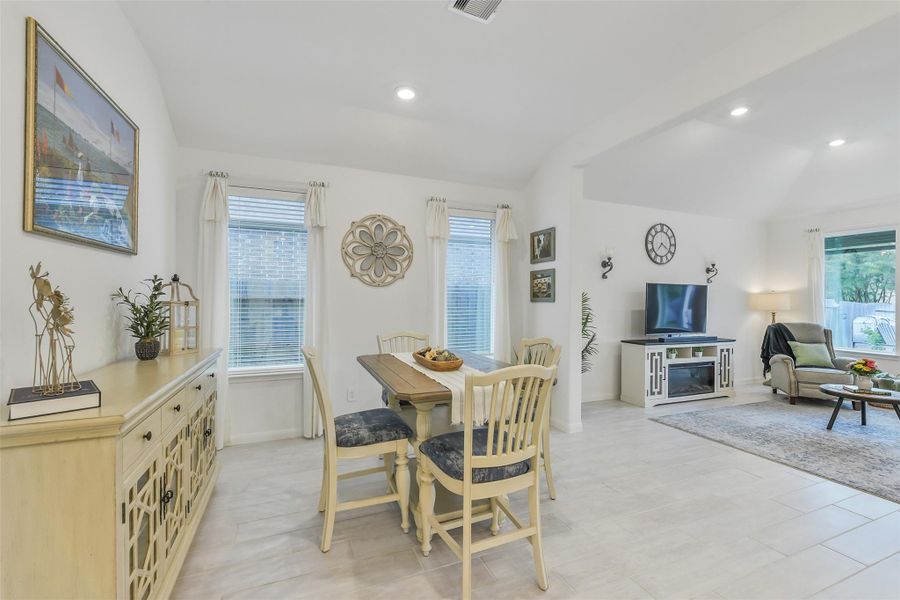 Two large windows bring natural light to this beautiful space. This home's open floor plan brings everyone together, while strategic partial walls provide clear divisions of space to make decorating and furnishing simple!