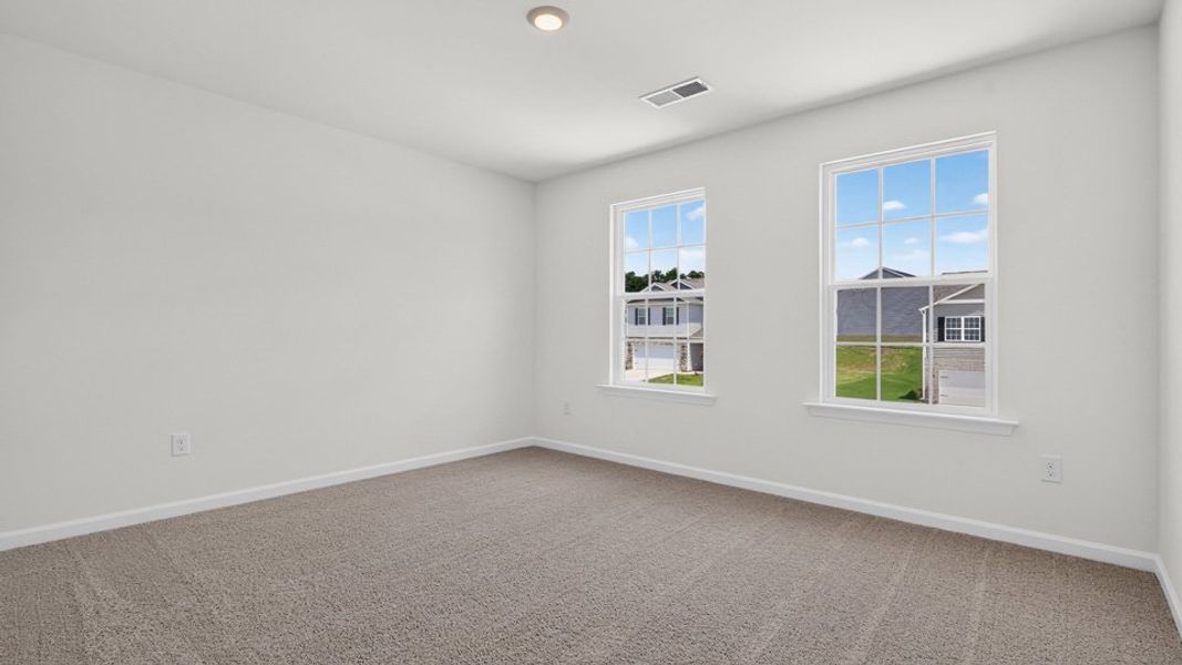 Spacious, unfurnished interior of a new home in The Reserve at Prestleigh, Wake Forest (Image 23).
