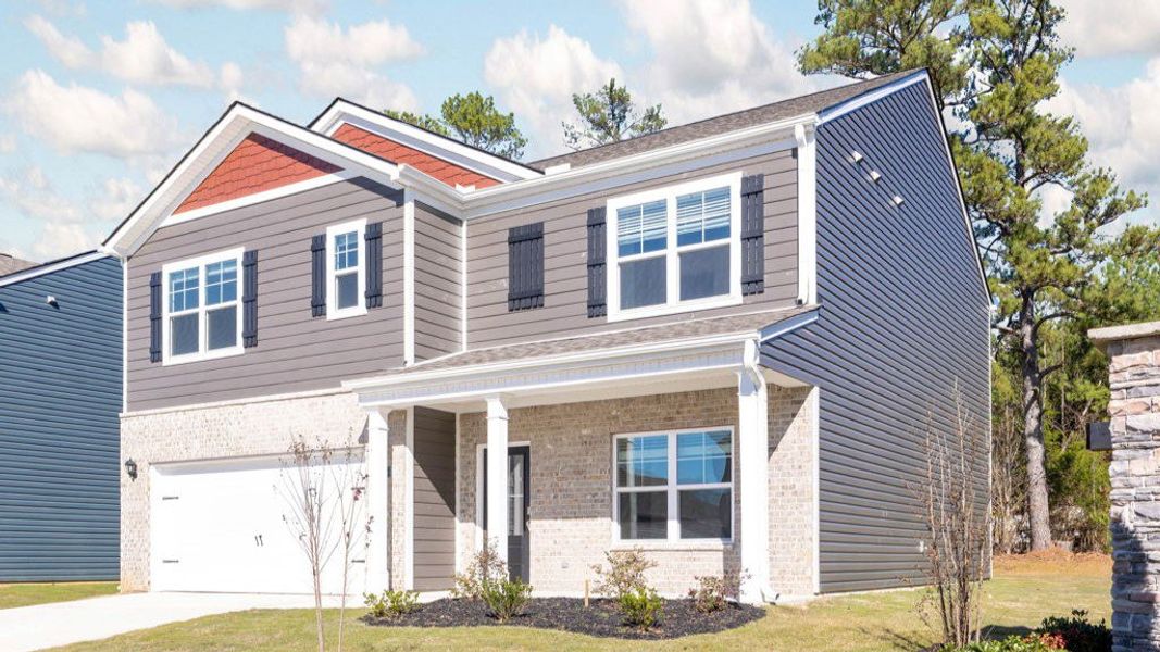 Front exterior of a new home in Hillcrest Landing, McDonald, TN, highlighting curb appeal (Image 2).