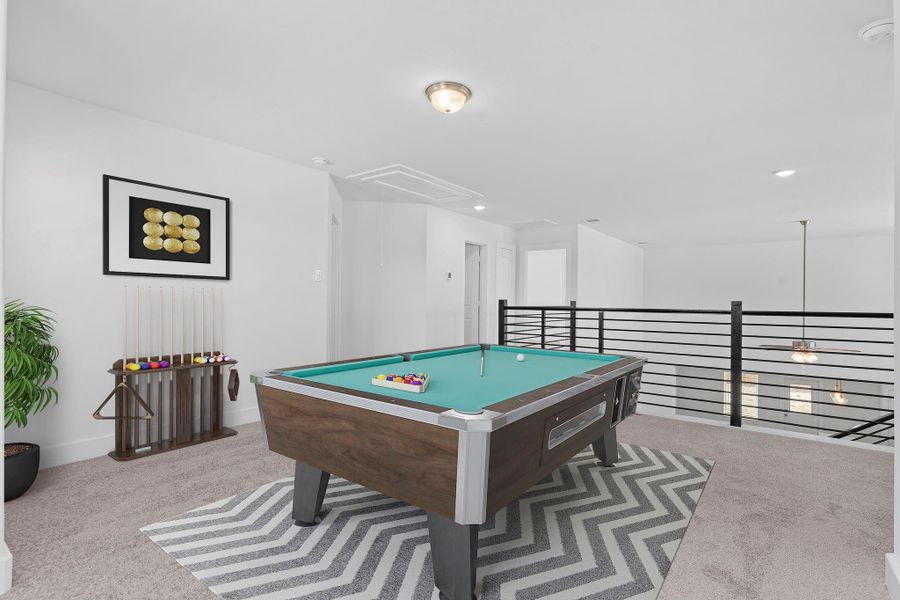 This virtually staged game room not only offers a fantastic space for recreation but also showcases breathtaking views from the upper level. Imagine relaxing or entertaining while enjoying the home’s open-concept design. This virtually staged game room not only offers a fantastic space for recreation but also showcases breathtaking views from the upper level. Imagine relaxing or entertaining while enjoying the home’s open-concept design.