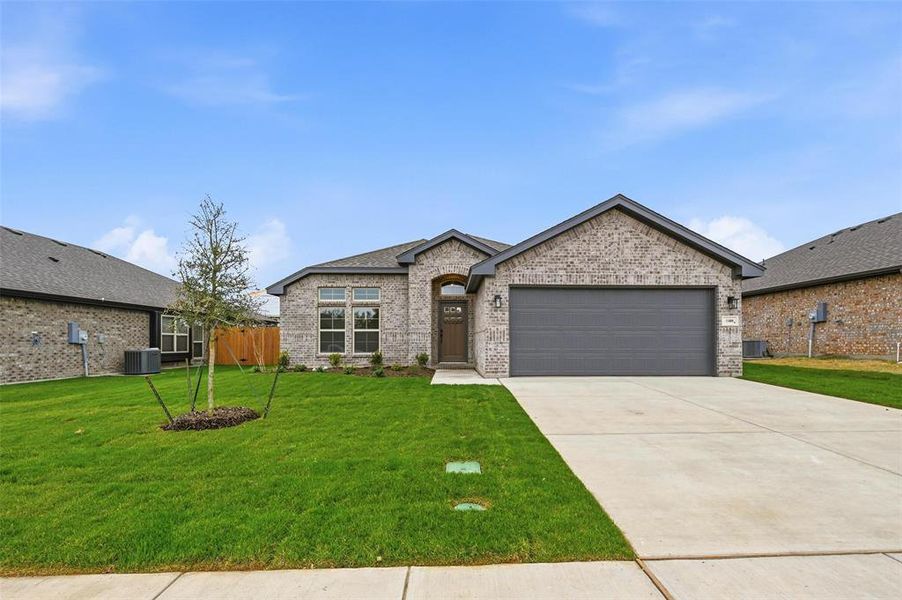 Front exterior of a new home in Trail Creek, Cleburne, TX, highlighting curb appeal (Image 25). Front exterior of a new home in Trail Creek, Cleburne, TX, highlighting curb appeal (Image 25).
