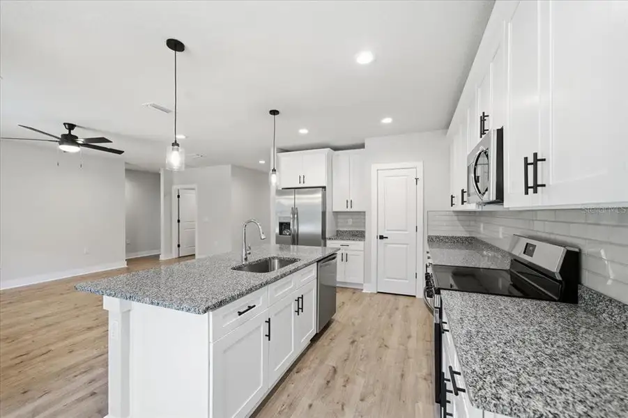 Furnished interior view inside a new home in , Weeki Wachee (Image 3).