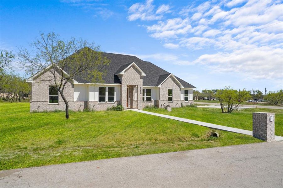 Front exterior of a new home in , Fort Worth, TX, highlighting curb appeal (Image 26).