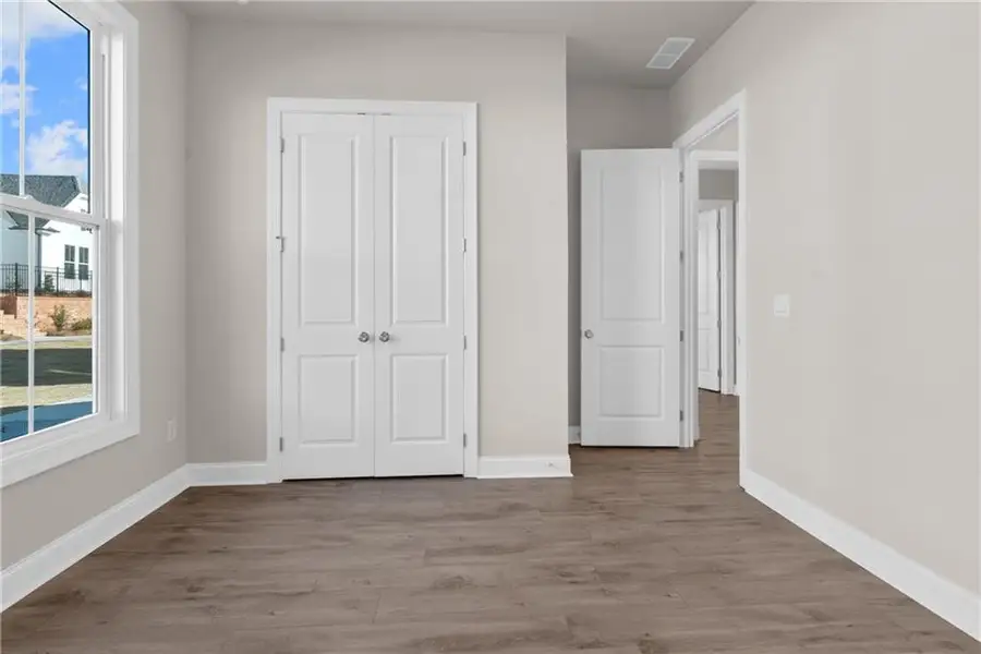 Spacious, unfurnished interior of a new home in Promenade at Sawnee Village, Cumming (Image 9).