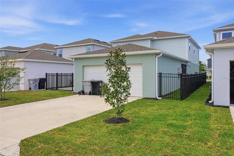 Front exterior of a new home in Winding Meadows, Apopka, FL, highlighting curb appeal (Image 22).