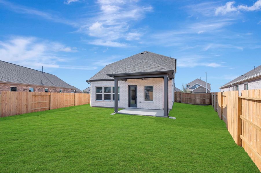 Exterior details and patio area of a home in Marvida, Cypress (Image 3).