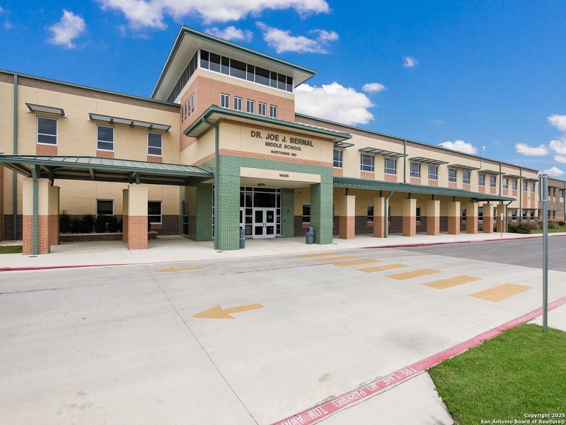 Front exterior of a new home in Stevens Ranch 55', San Antonio, TX, highlighting curb appeal (Image 24).