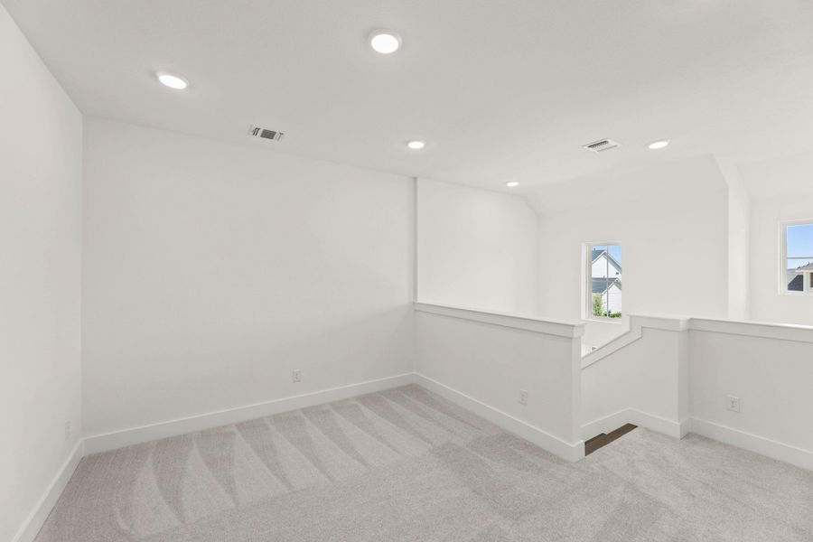 Spacious, unfurnished interior of a new home in The Retreat at Harvest, Argyle (Image 19).