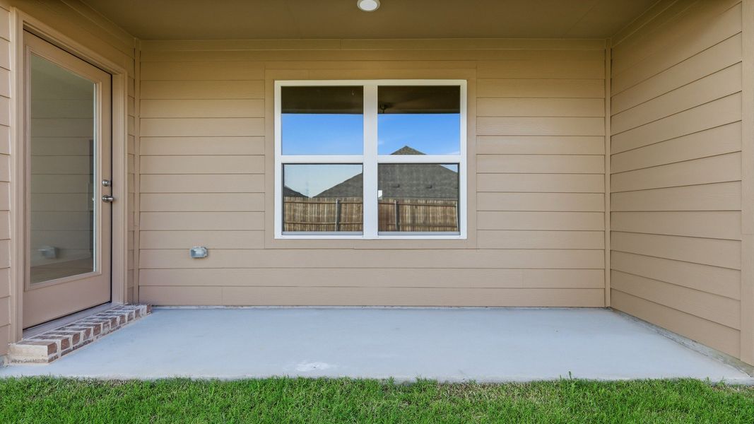 Exterior details and patio area of a home in Patriot Estates, Venus (Image 4). Exterior details and patio area of a home in Patriot Estates, Venus (Image 4).