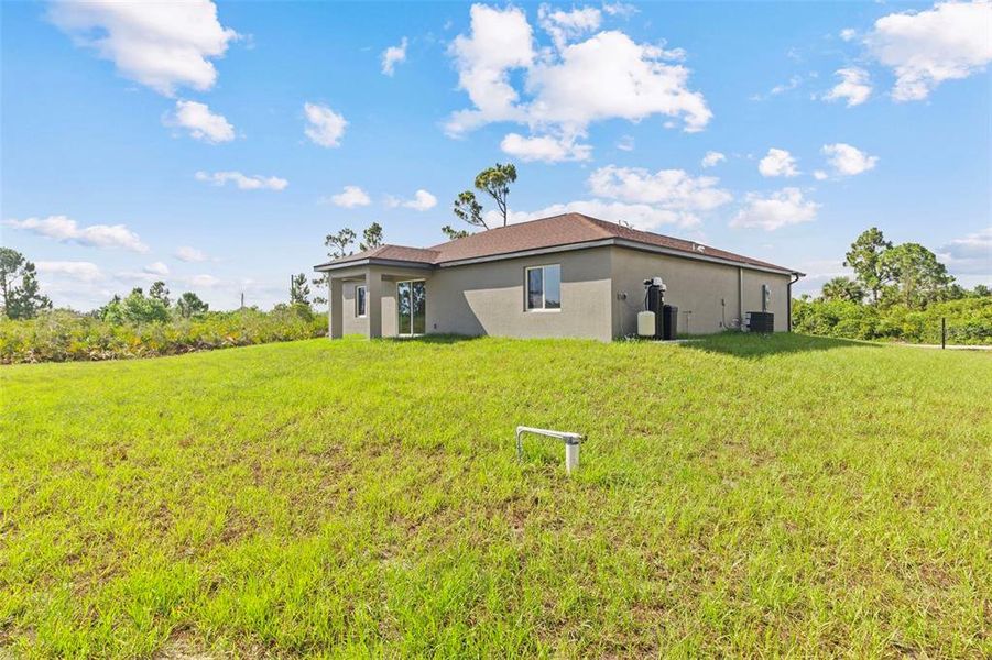 Exterior details and patio area of a home in , Port Charlotte (Image 22).